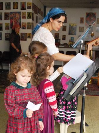 Children singing during a childrens liturgy